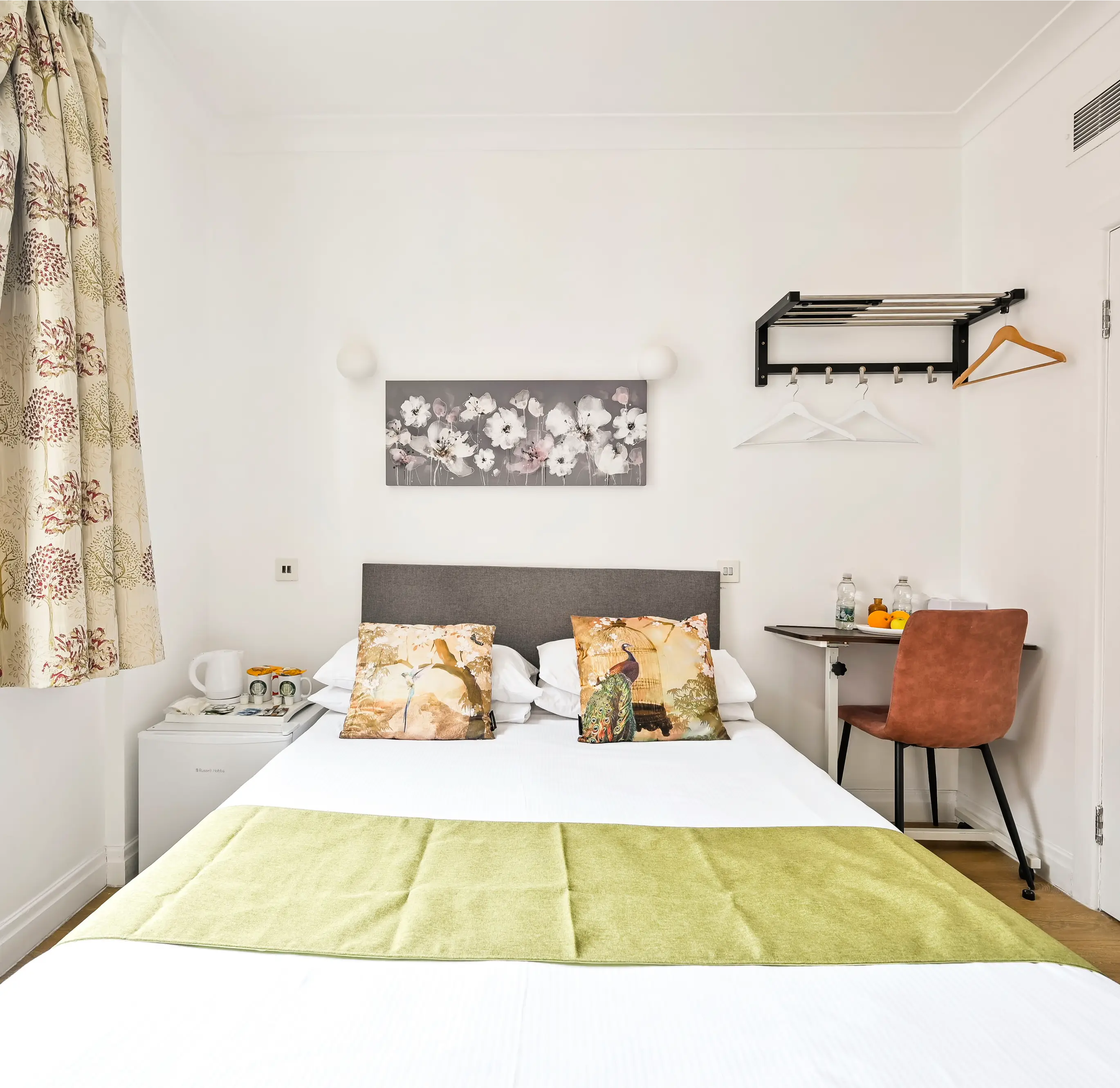 Cozy hotel room with floral decor